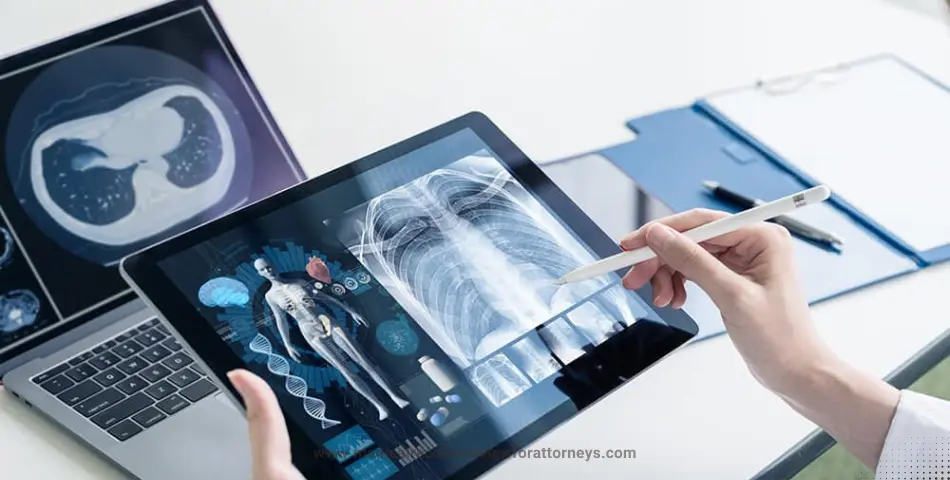 Medical professional analyzing chest X-ray on tablet with stylus and CT scan on laptop, illustrating OCR in medical records review