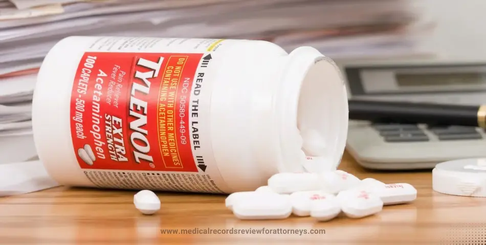 Tylenol Extra Strength acetaminophen bottle tipped over with pills spilling out, representing the Tylenol class action lawsuit