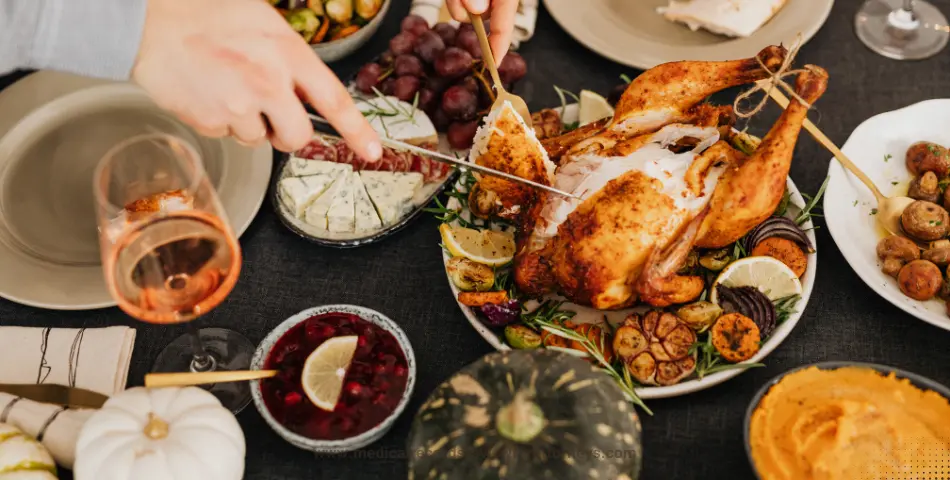 Person carving roasted turkey with sides and wine on table, illustrating Thanksgiving accident claims