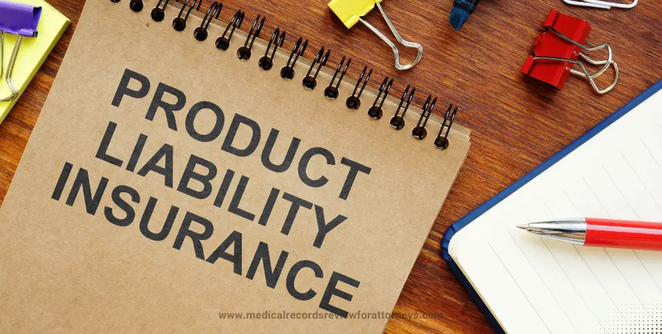 Notebook labeled product liability insurance with office supplies representing product liability review.